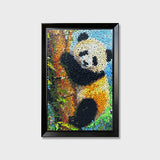 A Quiet Moment button art featuring a panda climbing a tree in a peaceful natural landscape