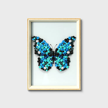 Blue Butterfly button art kit featuring a vibrant blue butterfly design