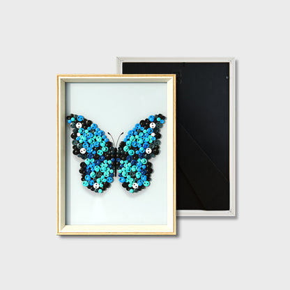 Finished Blue Butterfly button art featuring a vibrant blue butterfly