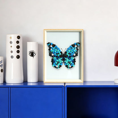 Blue Butterfly textured wall art displayed in a bright home interior