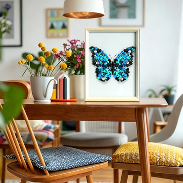 Blue Butterfly button art displayed as colorful wall decor in a cozy living room