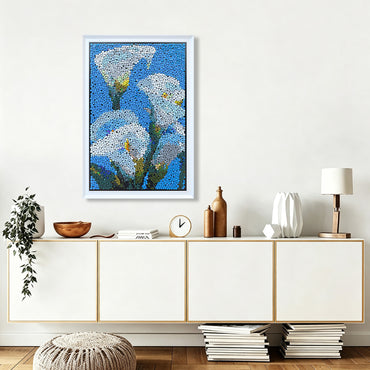 Blue Reverie Calla Lilies button art displayed as elegant floral wall decor in a cozy living room