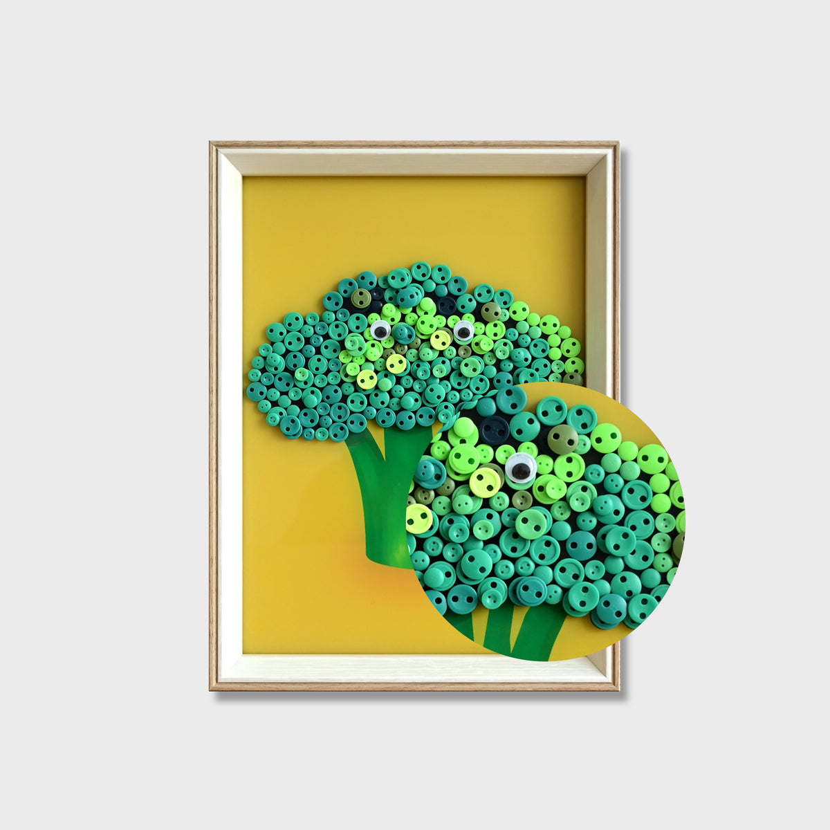 Close-up of Broccoli button art showing layered green buttons and detailed textured vegetable details