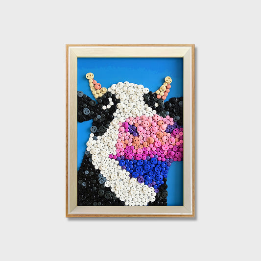 Cow button art kit featuring a cute black and white cow design