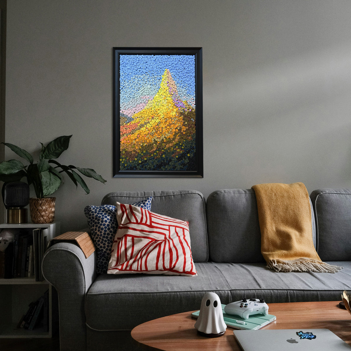 Crowned by Light textured wall art featuring sunlit golden mountains displayed in a stylish home interior