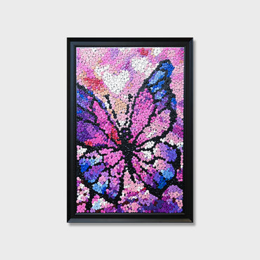Dreamscape Butterfly button art featuring a large purple butterfly with open wings flying against a pink and purple background