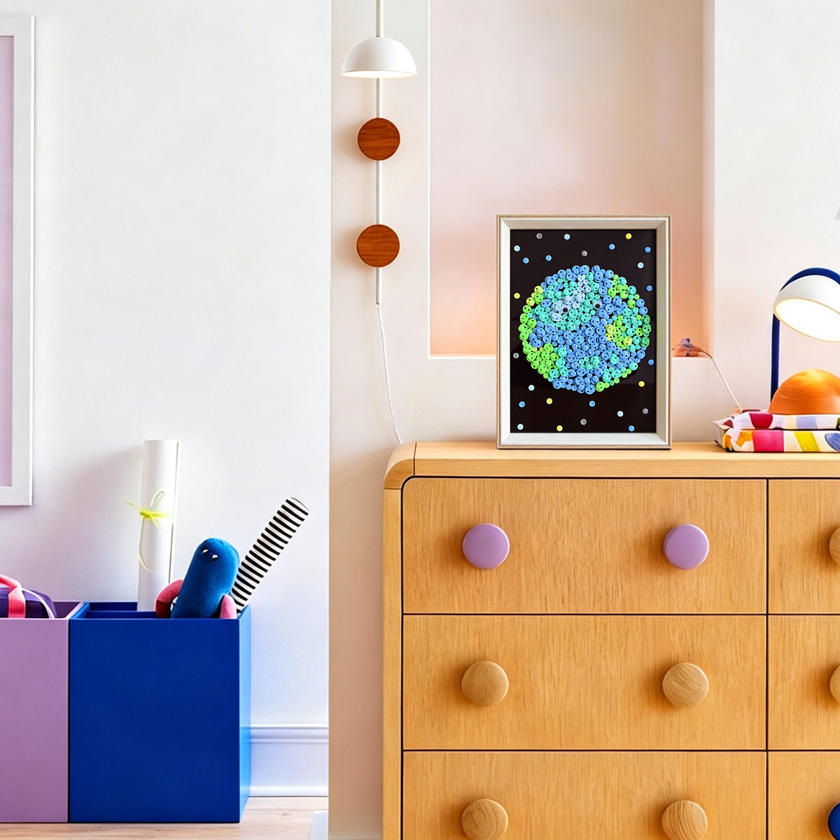 Earth DIY button art featured as colorful space-inspired home decor