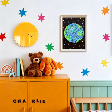 Earth button art displayed as unique wall decor in a cozy living room