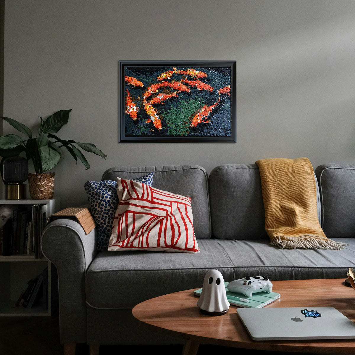 Fortune in Motion textured wall art featuring red koi fish displayed in a stylish home interior