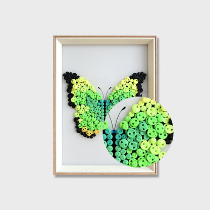 Close-up of Green Butterfly button art showing layered green buttons and detailed wing textures