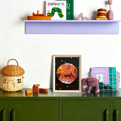 Mars button artwork adding a playful artistic touch to a room