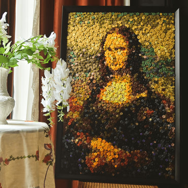The Mona Lisa button art displayed as classic portrait wall decor in a cozy living room