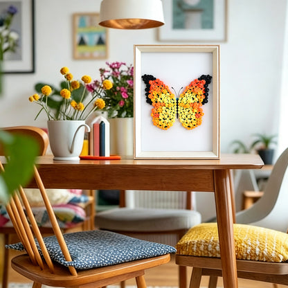 Orange Butterfly button artwork adding a warm and colorful artistic touch to a room