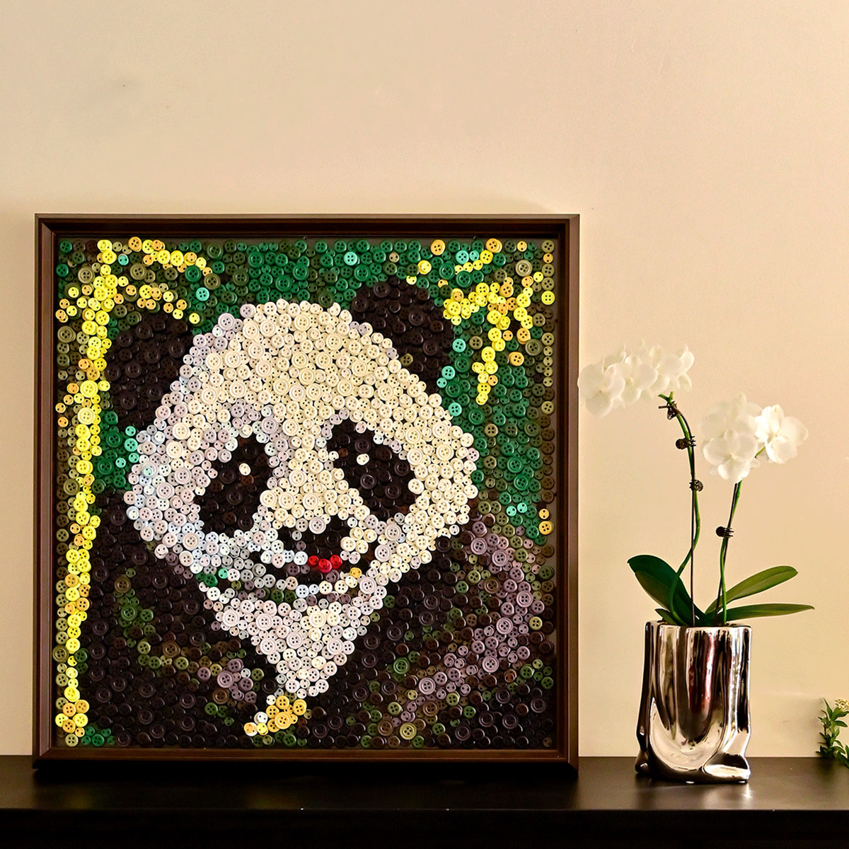 Panda button art displayed as charming animal wall decor in a cozy living room