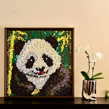 Panda button art displayed as charming animal wall decor in a cozy living room