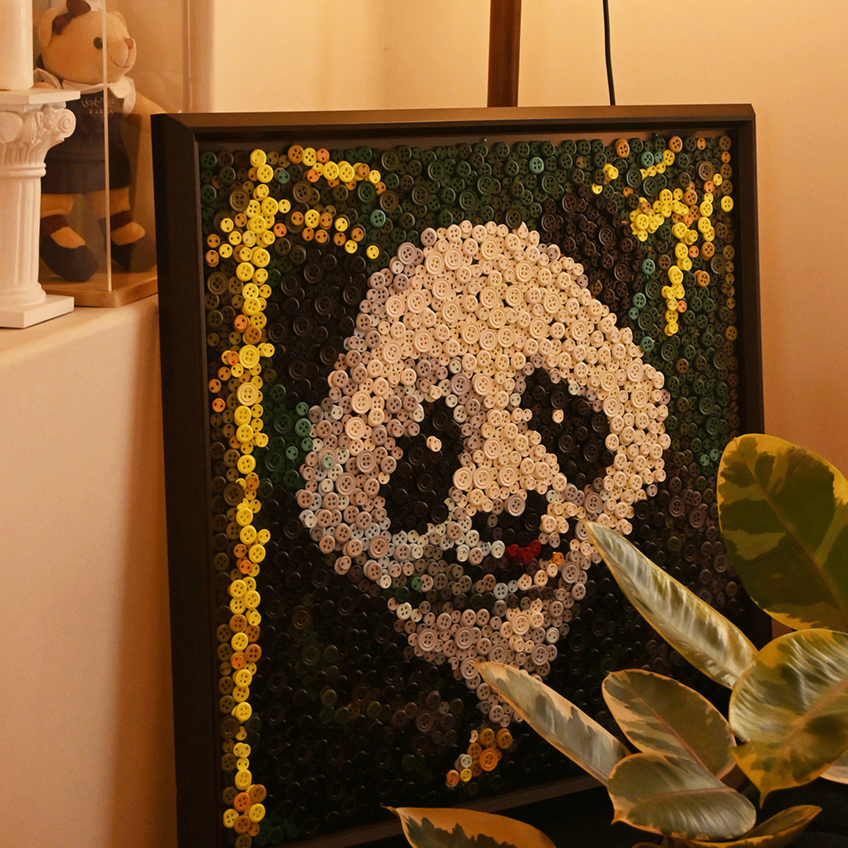 Panda button artwork featured as playful nature-inspired home decor