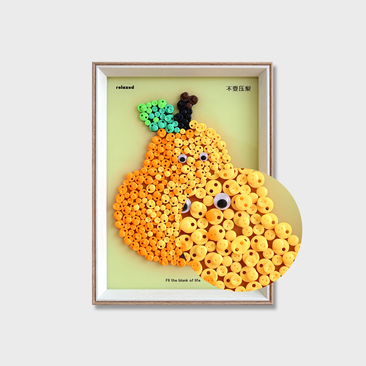 Close-up of Pear button art showing layered green buttons and detailed textured fruit details