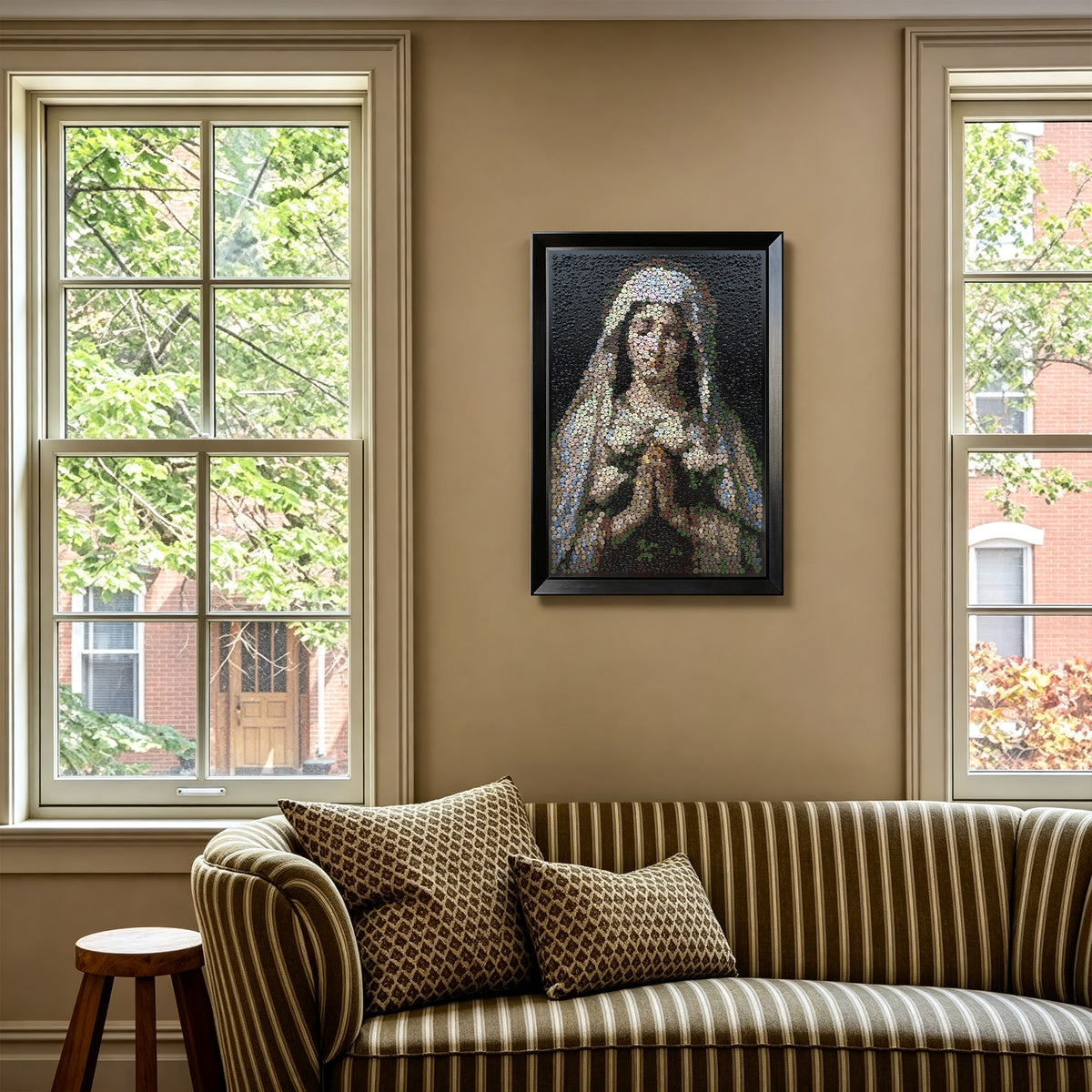Praying Virgin Mary button art displayed as meaningful religious wall decor in a modern interior