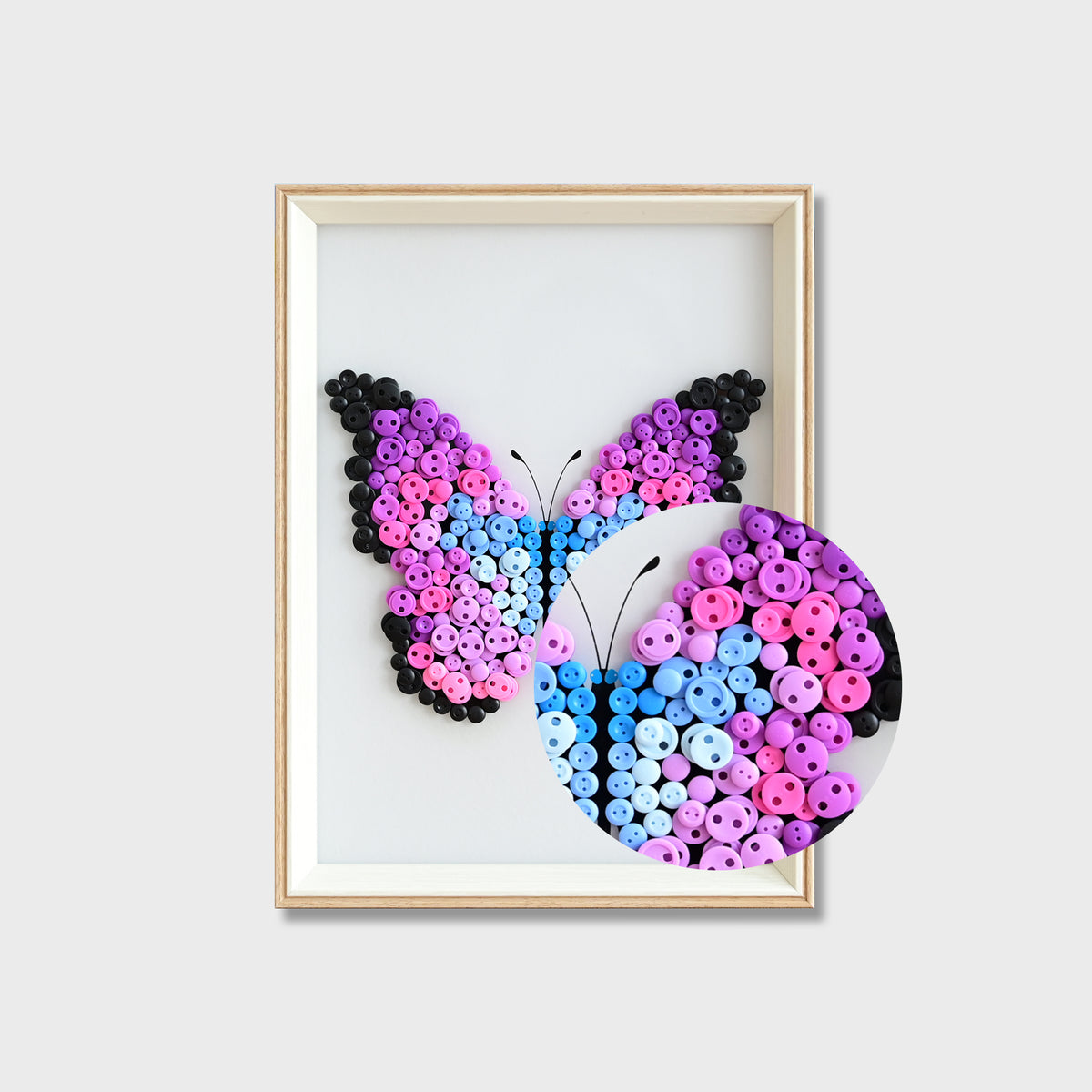 Close-up of Purple Butterfly button art showing layered purple buttons and detailed wing textures