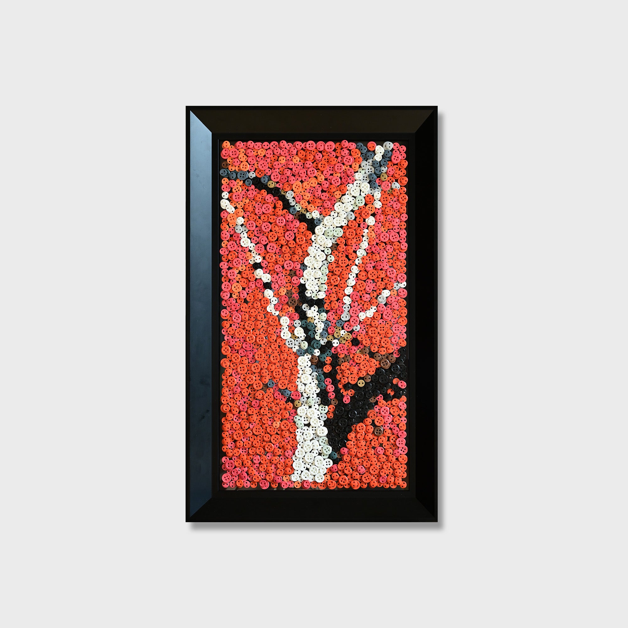 The Feigenbaum vor roter Erde button art featuring a fig tree against a striking red earth background