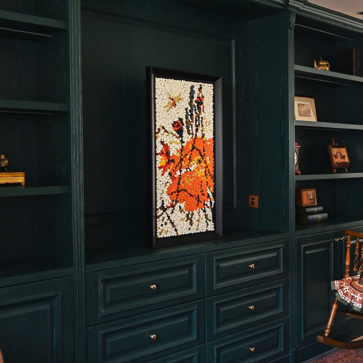 The Lotus and Dragonfly button art displayed as statement botanical wall decor in a modern interior