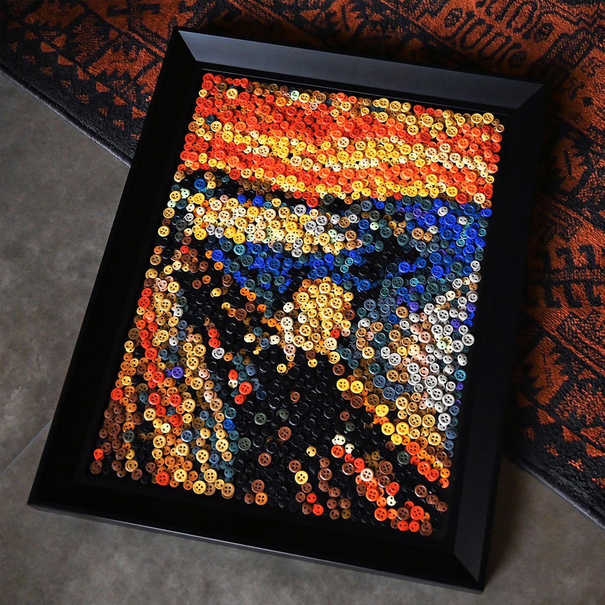 The Scream button art displayed as expressive wall decor in a cozy living room