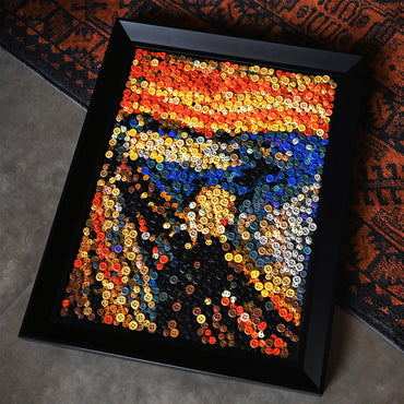 The Scream button art displayed as expressive wall decor in a cozy living room