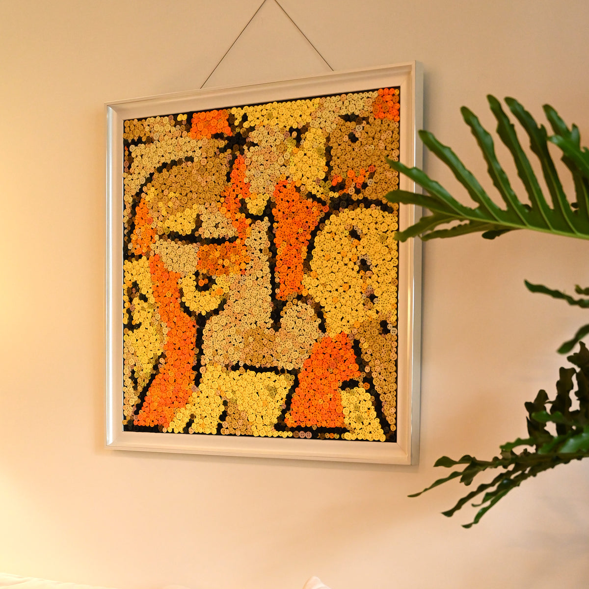 The Signes en Jaune wall art adding a vibrant yellow artistic touch to a room