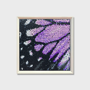 Velvet Wings button art featuring a close-up of a purple butterfly wing